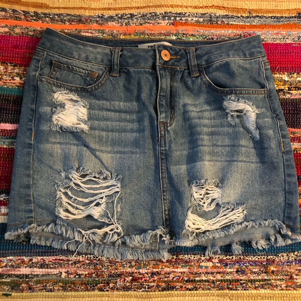 Distressed denim skirt